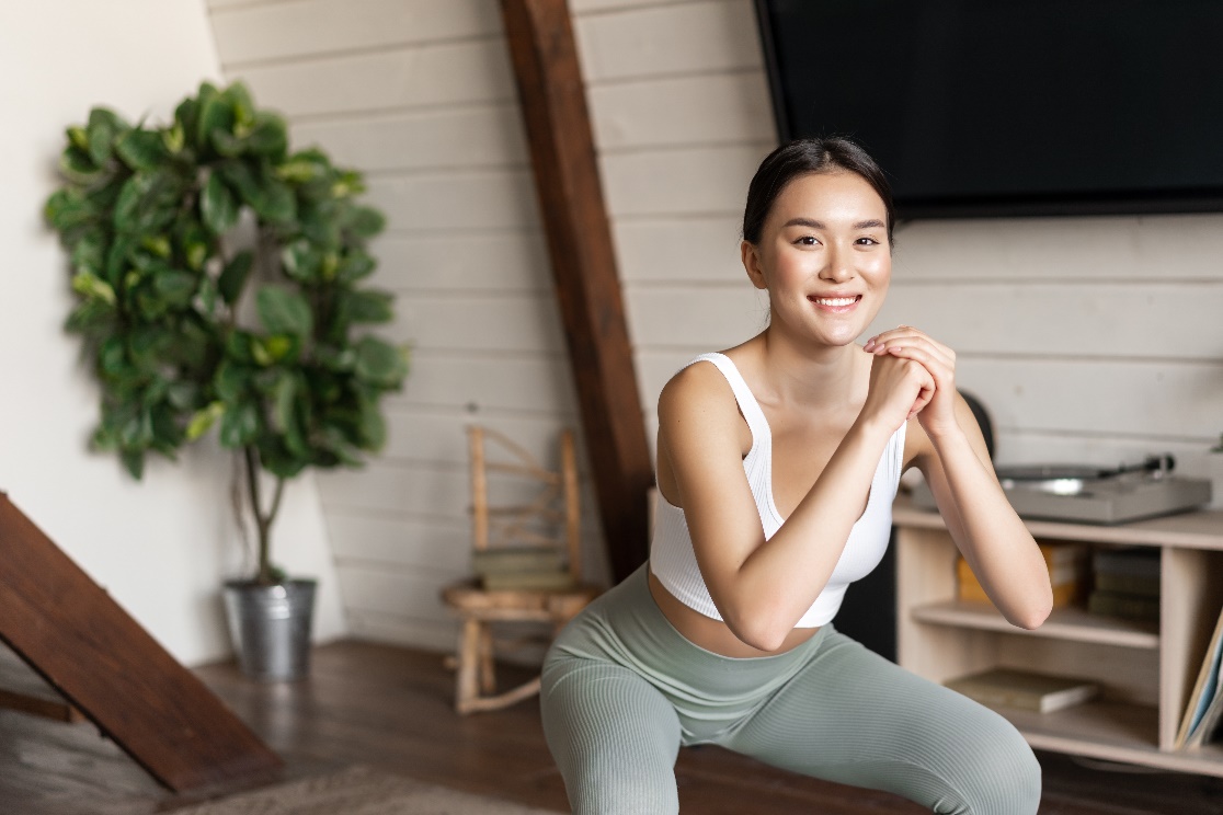 Woman exercising as part of a wellness program